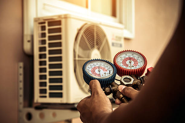 Professional Air Conditioning Service technician working in Baldwin, PA